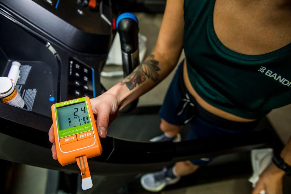 a person holding results from lactate test