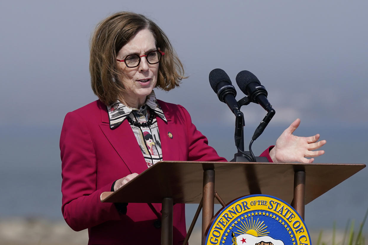 Oregon Gov. Kate Brown is pardoning an estimated 45,000 people convicted of simple possession of marijuana. (Jeff Chiu/AP)