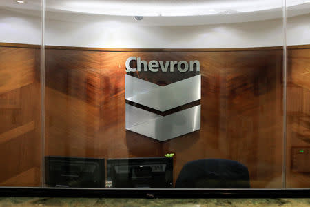 The logo of Chevron is seen at the company's office in Caracas, Venezuela April 25, 2018. REUTERS/Marco Bello/File Photo