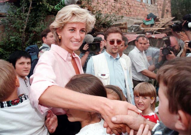 Diana, Princess of Wales surrounded by children in Sarajevo 