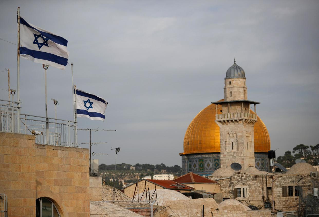 Israeli flags fly near the Dome of the Rock in the Al-Aqsa mosque compound in Jerusalem on 5 December 2017: AFP/Getty