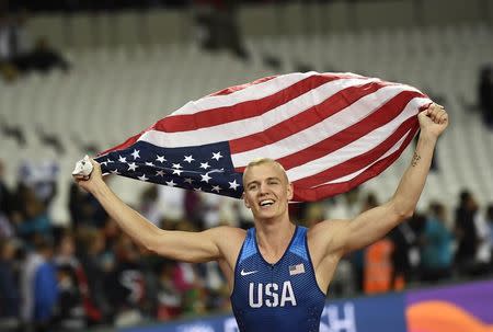 Athletics - World Athletics Championships –men’s pole vault final – London Stadium, London, Britain – August 8, 2017 – Sam Kendricks of the U.S. celebrates after winning the final. REUTERS/Dylan Martinez