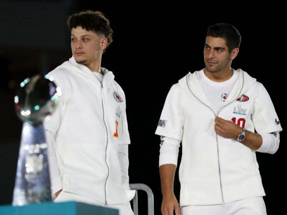 Patrick Mahomes and Jimmy Garoppolo during during Super Bowl LIV Opening Night (Getty)