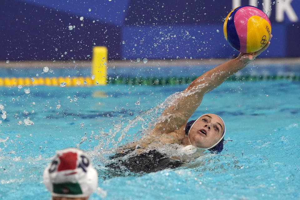 United States' Margaret Steffens reaches for the ball during a preliminary round women's water polo match against South Africa at the 2020 Summer Olympics, Wednesday, July 28, 2021, in Tokyo, Japan. (AP Photo/Mark Humphrey)