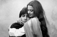 Amitabh Bachchan and Rekha in Silsila (1981) <p> The alleged off-screen romance that had India spellbound was finally adapted to the screen by Yash Chopra. He had the audacity to sack Parveen Babi and Shabana Azmi eight days after shooting and from the wings emerged Rekha and Jaya Bhaduri respectively to replace the two. In the incredibly melodious ‘Yeh Kahaan Aa Gaye Hum’, a chartbuster with Amitabh spouting verses every now and then, is a montage of superimposed scenes featuring tulips, walks in the garden, and well, Amitabh and Rekha rolling in bed.</p>