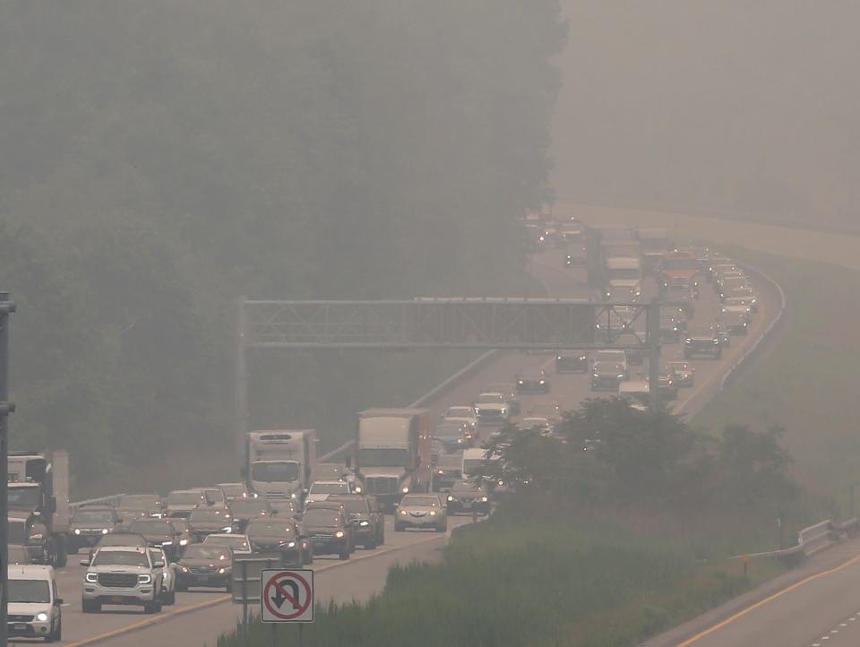 Traffic moves northbound in a haze covered Interstate 684 northbound in Southeast June 7, 2023. Smoke from wildfires in Canada continue to cover our area.