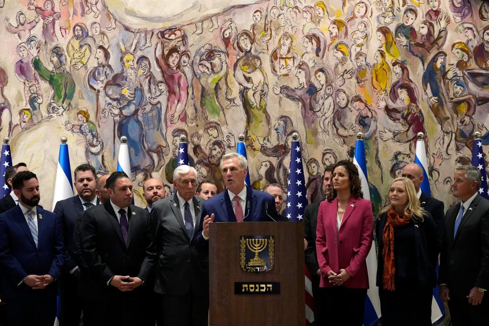 U.S. Speaker of the House Kevin McCarthy, center, is joined by a U.S. Congressional delegation as he speaks after a session of Israel's parliament, the Knesset in Jerusalem, Monday, May 1, 2023. (AP Photo/Ohad Zwigenberg)