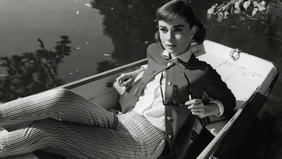 A film still of Audrey Hepburn in the movie "Love in the Afternoon." - HA/THA/Shutterstock