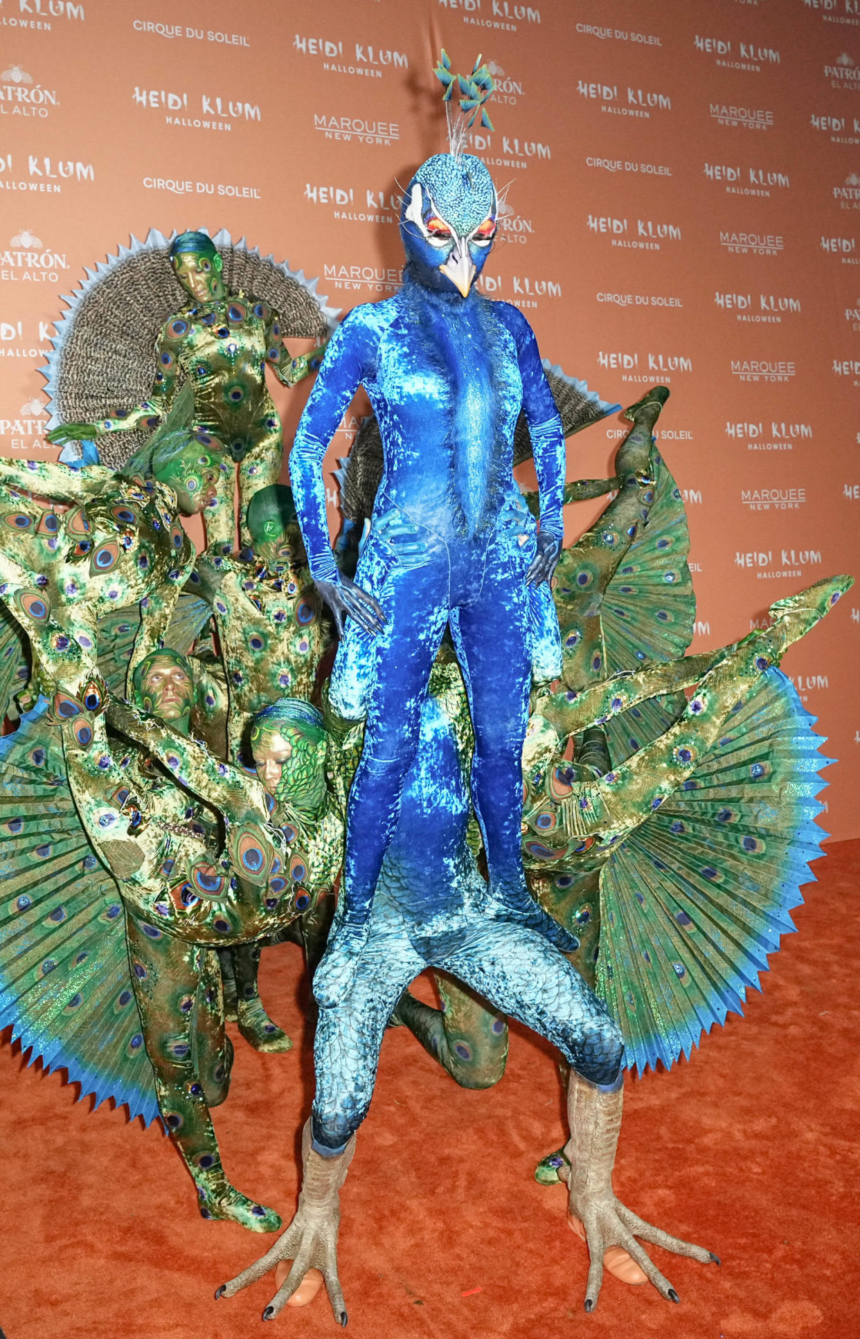 Heidi Klum's wild Halloween costume even has Cirque Du Soleil acrobats
