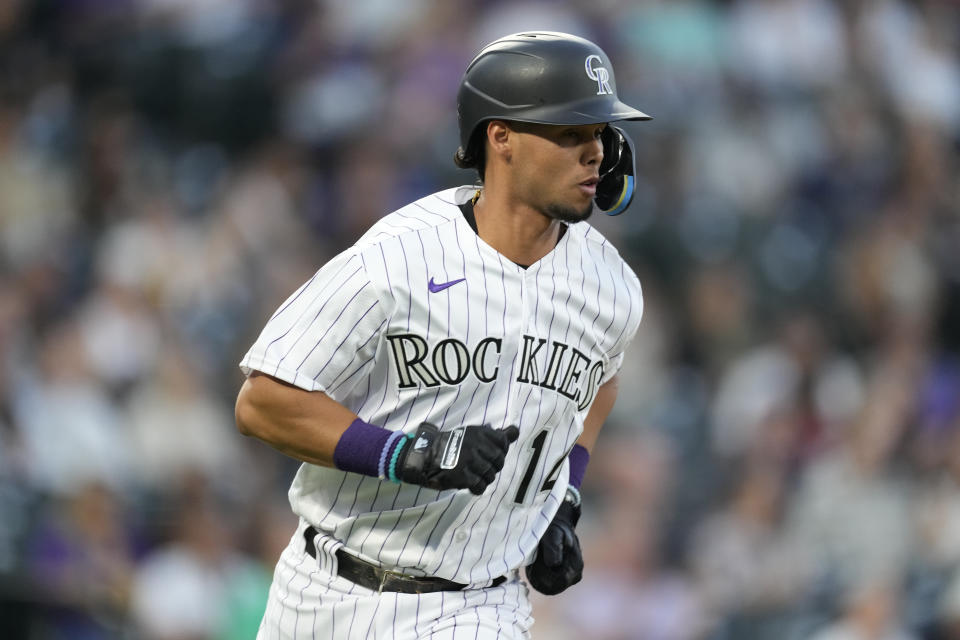 Colorado Rockies' Ezequiel Tovar runs after hitting a single off San Diego Padres starting pitcher Sean Manaea during the second inning of a baseball game Friday, Sept. 23, 2022, in Denver. (AP Photo/David Zalubowski)