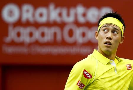 Japan's Kei Nishikori reacts as he plays Benoit Paire of France during their men's singles semifinal match at the Japan Open tennis championships in Tokyo October 10, 2015. REUTERS/Thomas Peter