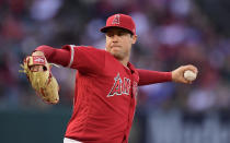 FILE - In this May 25, 2019, file photo, Los Angeles Angels starting pitcher Tyler Skaggs throws during the first inning of a baseball game against the Texas Rangers in Anaheim, Calif. The 27-year-old Los Angeles Angels pitcher was found unresponsive in his Texas hotel room after a drug overdose on July 1, 2019. He was 27. (AP Photo/Mark J. Terrill, File)