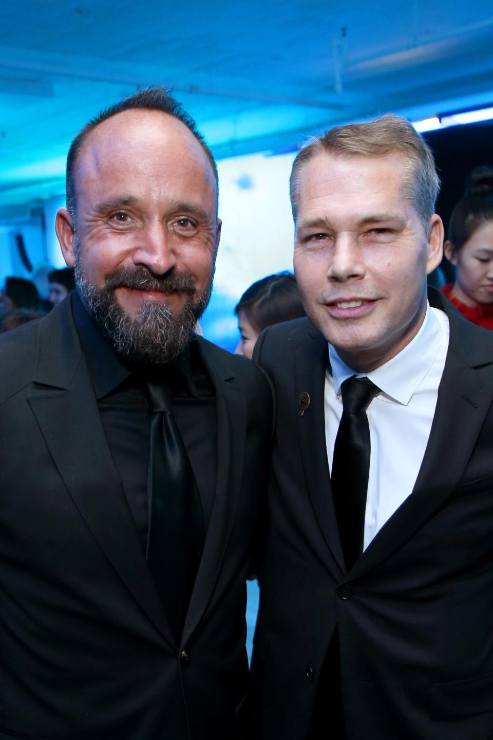 <h1 class="title">Michael Muller and Shepard Fairey</h1><cite class="credit">Photos: Getty Images</cite>