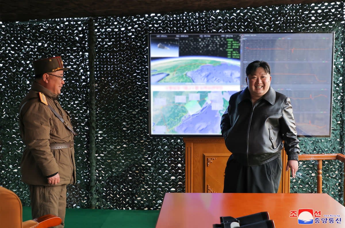 This picture taken on 2 April 2024 and released by North Korea’s official Korean Central News Agency (KCNA) on 3 April shows North Korean leader Kim Jong-un (R) inspecting the first test-fire of Hwasongpho-16B at suburbs of Pyongyang in North Korea (KCNA VIA KNS/AFP via Getty Image)