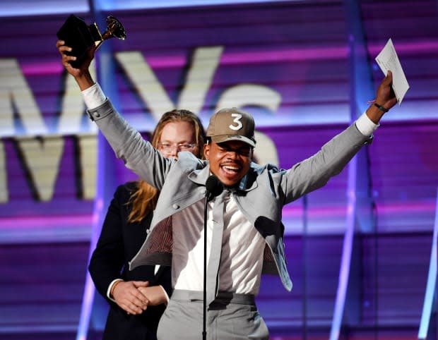 Chance The Rapper accepts the award for Best Rap Album onstage during The 59th GRAMMY Awards at STAPLES Center on Feb. 12, 2017, in Los Angeles.<p><a href="https://www.gettyimages.com/detail/634997130" rel="nofollow noopener" target="_blank" data-ylk="slk:Kevork Djansezian/Getty Images;elm:context_link;itc:0;sec:content-canvas" class="link ">Kevork Djansezian/Getty Images</a></p>