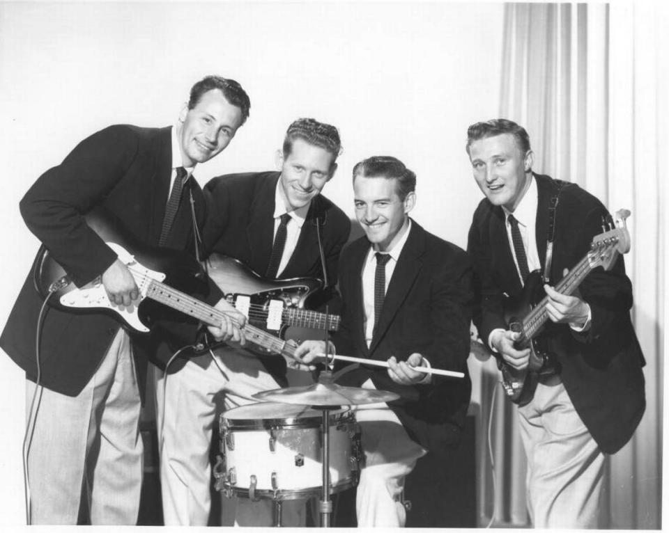 On April 26, 1960, the members of the Tacoma based rock group “The Ventures” modeled their clean cut rock look with matching blazers, ties and khakis for the photographers at Richards Studio in Tacoma. The fresh faced young musicians, (l to r) Nole F. (Nokie) Edwards, Bob Bogle, Howie Johnson and Don Wilson, posed with their shiny new Fender guitars for one of their earliest photo shoots.