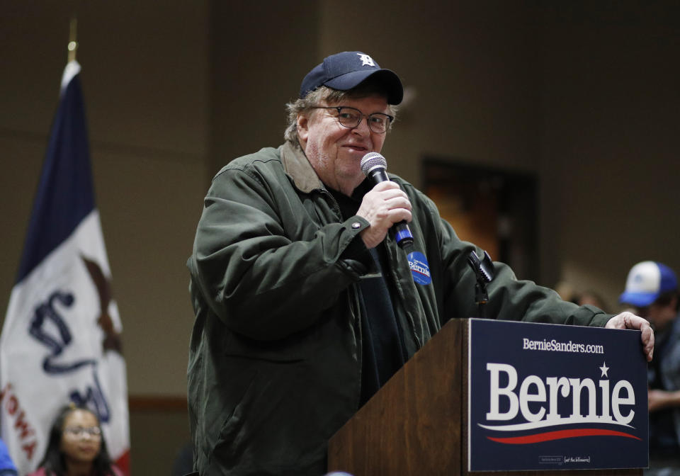 Filmmaker Michael Moore speaks at at a rally with democratic presidential candidate Sen. Bernie Sanders, I-Vt., Sunday, Jan. 26, 2020, in Storm Lake, Iowa. (AP Photo/John Locher)