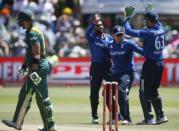 England's Adil Rashid celebrates with team-mates Jason Roy and Jos Buttler (2nd L-R) after dismissing South Africa's Faf du Plessis (L) during their second One-Day International cricket match in Port Elizabeth, February 6, 2016. REUTERS/Mike Hutchings