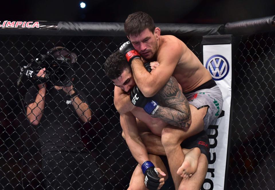 Feb 2, 2019; Fortaleza, Brazil; Demian Maia (red gloves) fights Lyman Good (blue gloves) during UFC Fight Night at Arena CFO. Mandatory Credit: Jason Silva-USA TODAY Sports