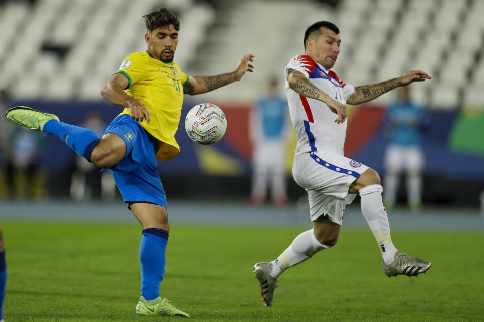 Brazil's Lucas Paqueta shots to score the opening goal during a Copa America quarterfinal soccer match against Chile at the Nilton Santos stadium in Rio de Janeiro, Brazil, Friday, July 2, 2021. (AP Photo/Bruna Prado)