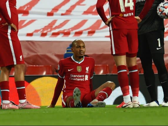 Fabinho of Liverpool goes off  hamstring problem (Getty)