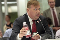 City Councilman Daniel Halloran III speaks during a New York City Board of Health public hearing on the proposal to limit the size of sugary drinks Tuesday, July 24, 2012 in New York. New York faced the next step in a bitter battle over large sugary drinks Tuesday, with the soft drink and restaurant industries protesting the mayor's proposed ban and the public lining up to have its say. (AP Photo/Mary Altaffer)