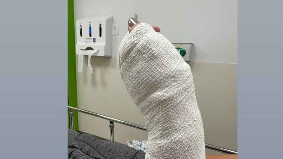 a woman's bandaged wrist 