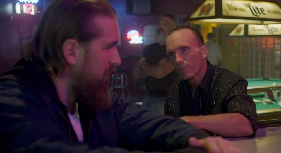 Adam Hampton, left, and Peter Greene appear in a scene from the Oklahoma crime-thriller "Out of Exile."