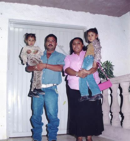 Guillermo Arevalo Pedraza (2nd L) poses with his wife and daughters in an undated photo released by his family in Nuevo Laredo, Mexico. REUTERS/Family of Guillermo Arevalo Pedraza/Handout via Reuters