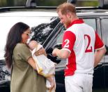 <p>The mother and newborn watched on as Prince Harry competed in the Khun Vichai Srivaddhanaprabha Memorial Polo Trophy at Billingbear Polo Club on 10 July in Wokingham. Following the game, Prince Harry could be seen looking at his son affectionately. </p>