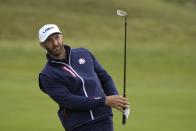 Team USA's Dustin Johnson hits on the fifth hole during a practice day at the Ryder Cup at the Whistling Straits Golf Course Thursday, Sept. 23, 2021, in Sheboygan, Wis. (AP Photo/Charlie Neibergall)