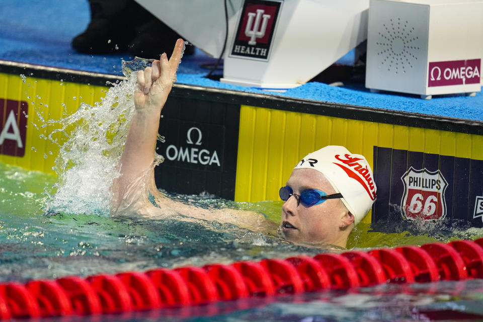 Lilly King celebrates winning the women's 200-meter breaststroke at the U.S. nationals swimming meet in Indianapolis, Wednesday, June 28, 2023. (AP Photo/Michael Conroy)