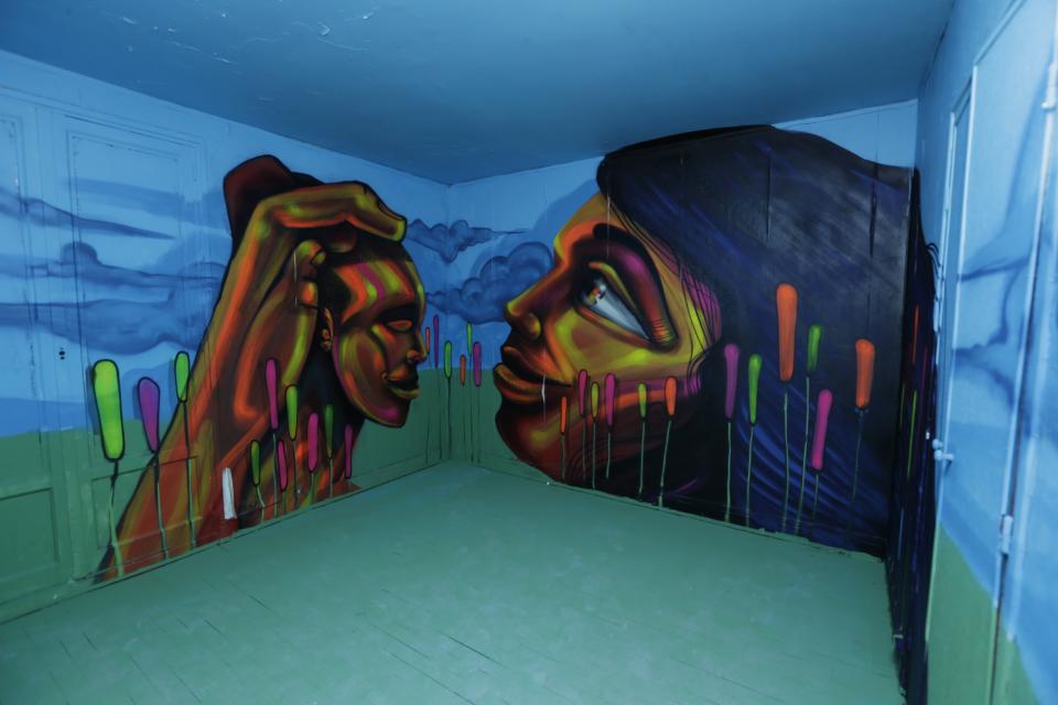 A living room painted by Brazilian street artist 2mil is seen at the street art project tower "Paris Tour 13" in Paris