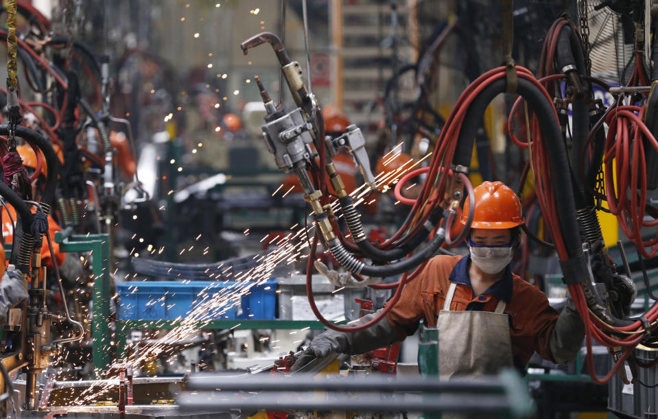 chinese manufacturing factory worker automotive Geely