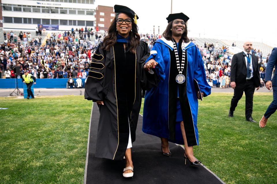 Keynote speaker Oprah Winfrey, left, arrives with Tennessee State University President Glenda Glover, right, for the 2023 Spring commencement ceremony at Tennessee State University in Nashville, Tenn., Saturday, May 6, 2023.