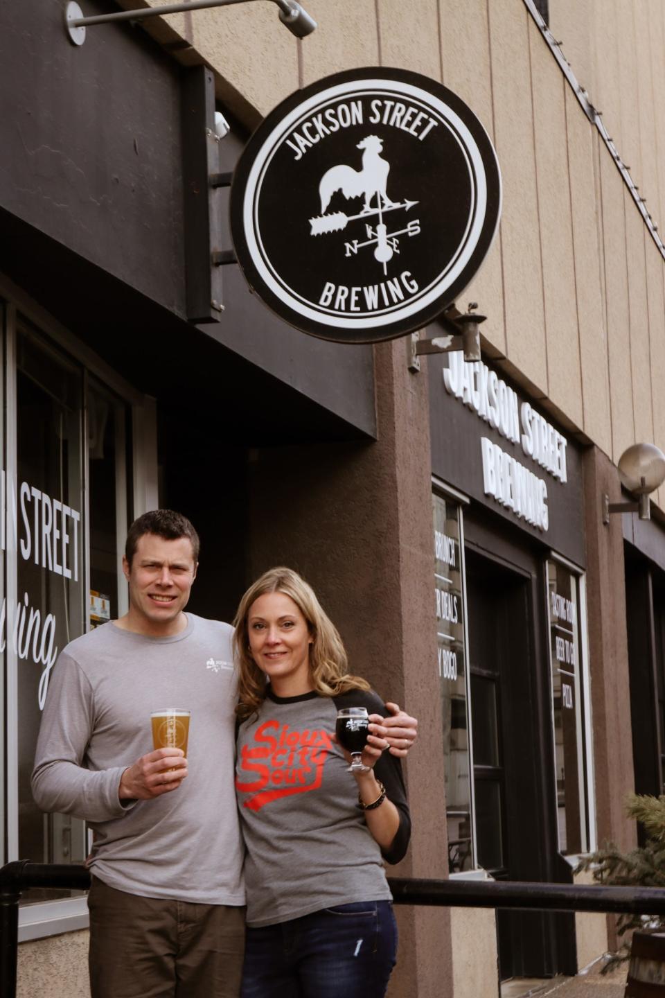 Dave Winslow and Tia Heidebrecht, a married couple and owners of Jackson Street Brewing, met when he was a meteorologist and she was a photographer and reporter at KTIV in Sioux City.