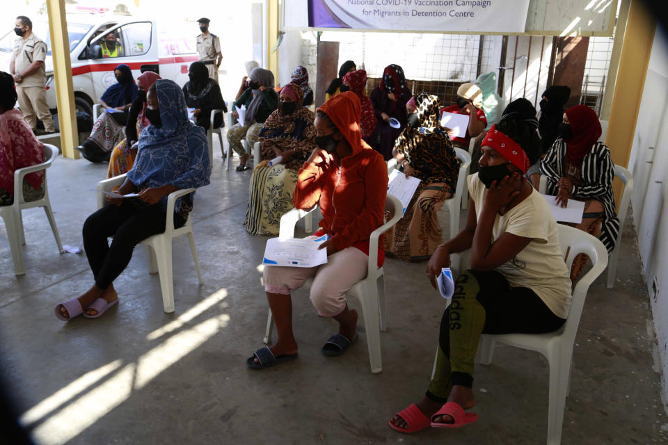 A vaccination campaign against the coronavirus is underway at a Tripoli shelter for migrants, organized jointly by the Libyan center for disease control and the International Organization for Migration. in Tripoli, Libya, Wednesday Oct. 6, 2021. (AP Photo/Yousef Murad)