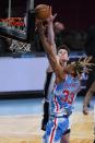 Brooklyn Nets' Nicolas Claxton (33) drives past San Antonio Spurs' Drew Eubanks (14) during the second half of an NBA basketball game Wednesday, May 12, 2021, in New York. (AP Photo/Frank Franklin II)