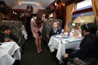 <p><strong>When: October 16, 2017</strong><br>The Duchess looked radiant in her floral Orla Kiely dress as she welcomed children for the charity train ride. <em>(Photo: PA)</em> </p>