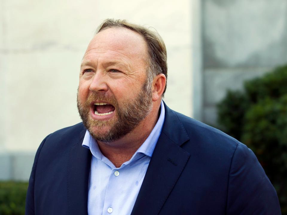 Infowars host and conspiracy theorist Alex Jones speaks outside of the Dirksen building on Capitol Hill in Washington, Sept. 5, 2018.