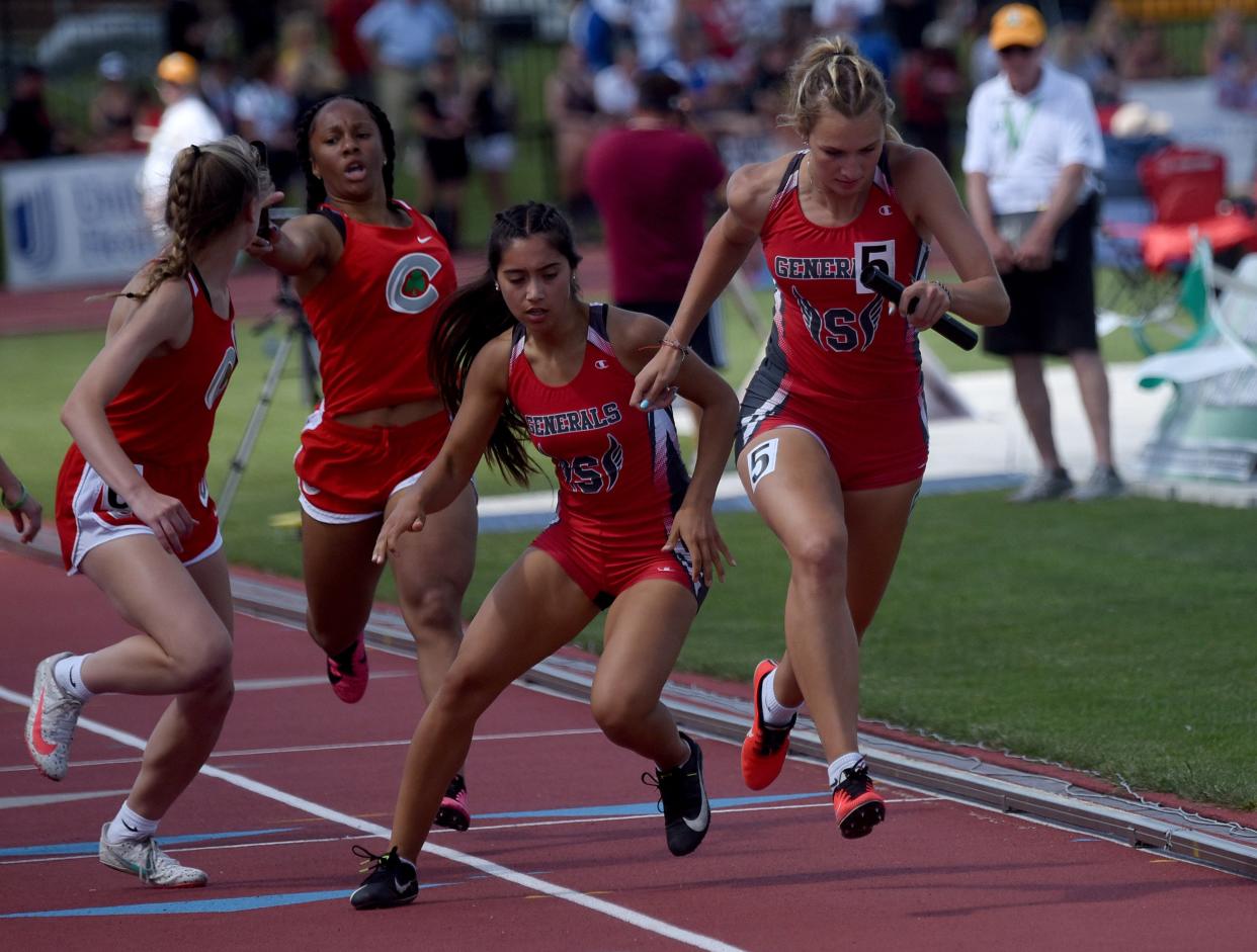 Sheridan freshman Beckett Strong races to hand off to teammate Julie Nichols in 1600 relay on day one of the OHSAA Division II state track and field championships on Friday, June 3, 2022 at Jesse Owens Memorial Stadium in Columbus. Sheridans relay time qualified for the finals in the event on Saturday.