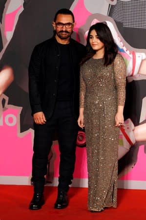 37th Hong Kong Film Awards - Hong Kong Cultural Centre - Indian actors Aamir Khan and Zaira Wasim pose on red carpet