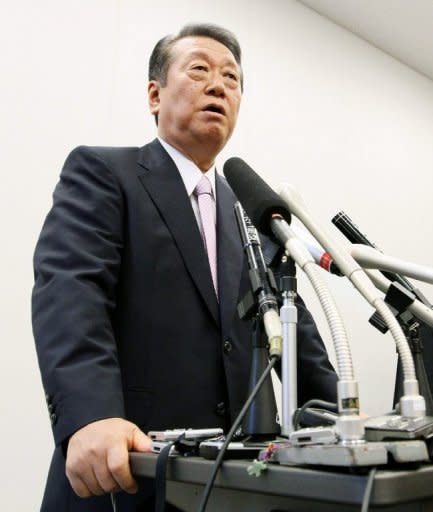 Former Democratic Party of Japan leader Ichiro Ozawa speaks during a press conference in Tokyo. Prime Minister Yoshihiko Noda's prized sales tax bill has passed Japan's lower house but a sizable rebellion and threatened party split left his future hanging in the balance