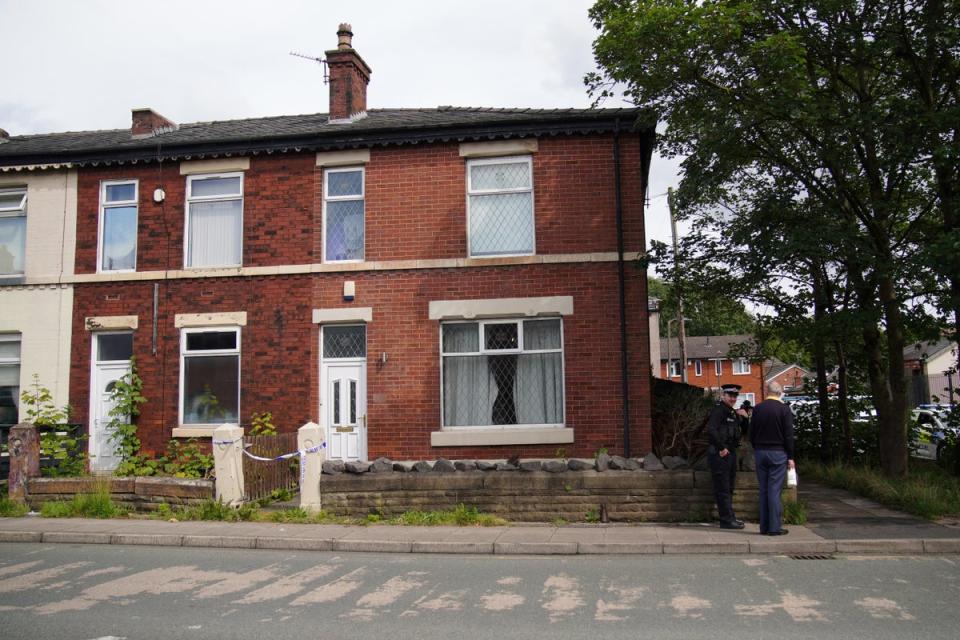 Police at the scene on Ainsworth Road (Peter Byrne/PA)