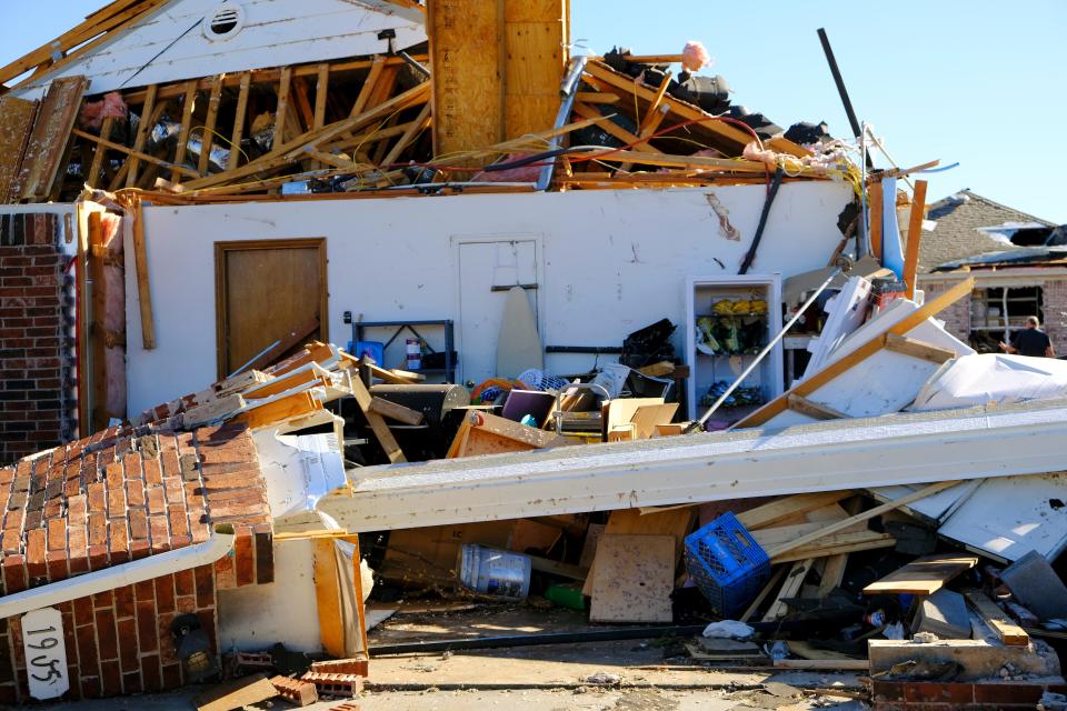 A tornado-damaged home is pictured Monday in the Eastridge neighborhood in Norman.