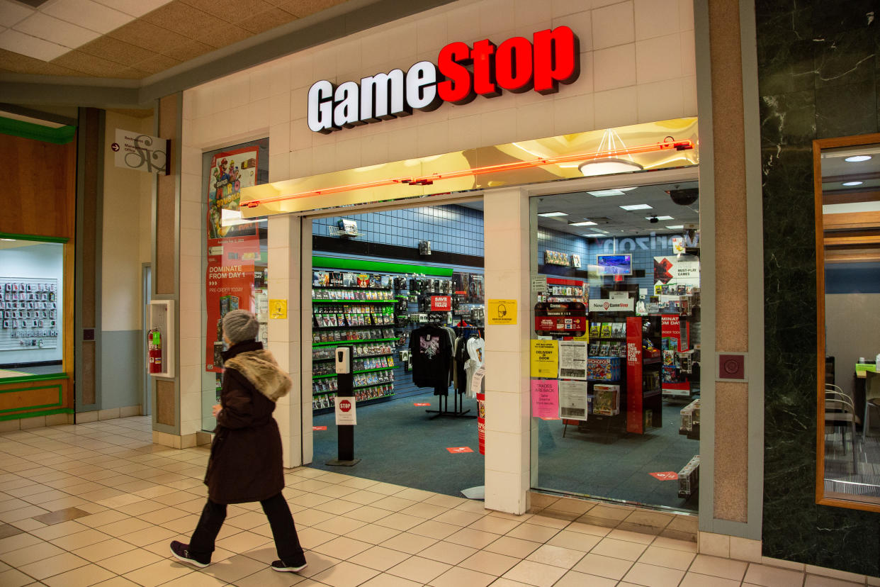 SELINSGROVE, PENNSYLVANIA, UNITED STATES - 2021/01/27: A woman walks past the GameStop store inside the Susquehanna Valley Mall.
An online group sent share prices of GameStop (GME) and AMC Entertainment Holdings Inc. (AMC) soaring in an attempt to squeeze short sellers. (Photo by Paul Weaver/SOPA Images/LightRocket via Getty Images)