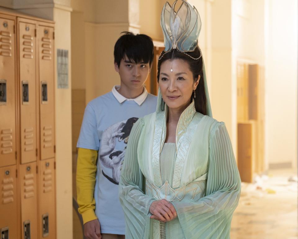 Jim Liu, left, and Michelle Yeoh in a scene from Disney+ series "American Born Chinese."