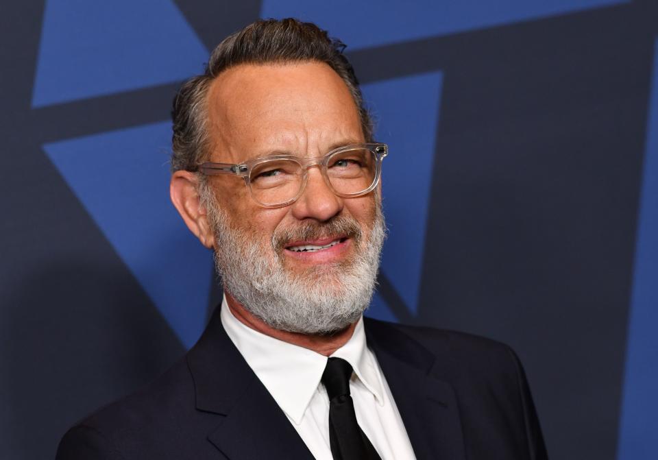 Tom Hanks addresses his COVID-19 battle — and the U.S. response to the pandemic — in a new interview. (Photo: Chris Delmas / AFP) (Photo by CHRIS DELMAS/AFP via Getty Images)