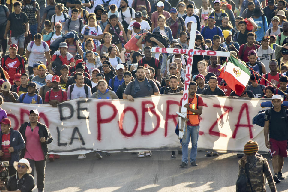 Migrants depart from Tapachula, Mexico, Sunday, Dec. 24, 2023. The caravan started the trek north through Mexico just days before U.S. Secretary of State Antony Blinken arrives in Mexico City to discuss new agreements to control the surge of migrants seeking entry into the United States. (AP Photo/Edgar H. Clemente)