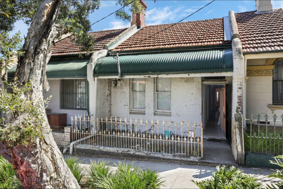 The worn front of the Pine Street property that is being sold by LJ Hooker Newtown.